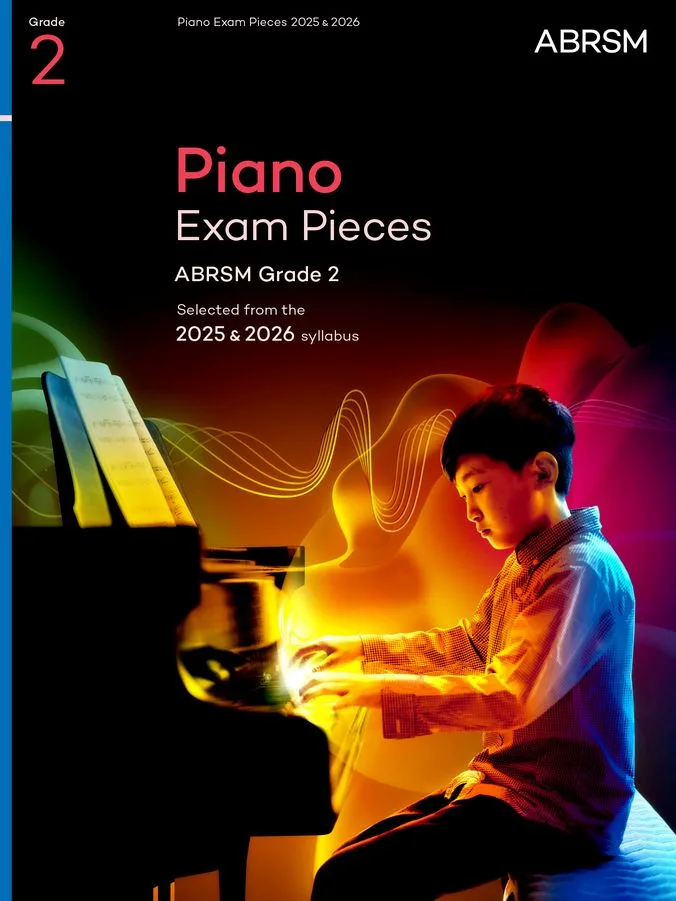 Cover of a book titled "Piano Exam Pieces Grade 2," featuring a piano and sheet music design in a colorful layout